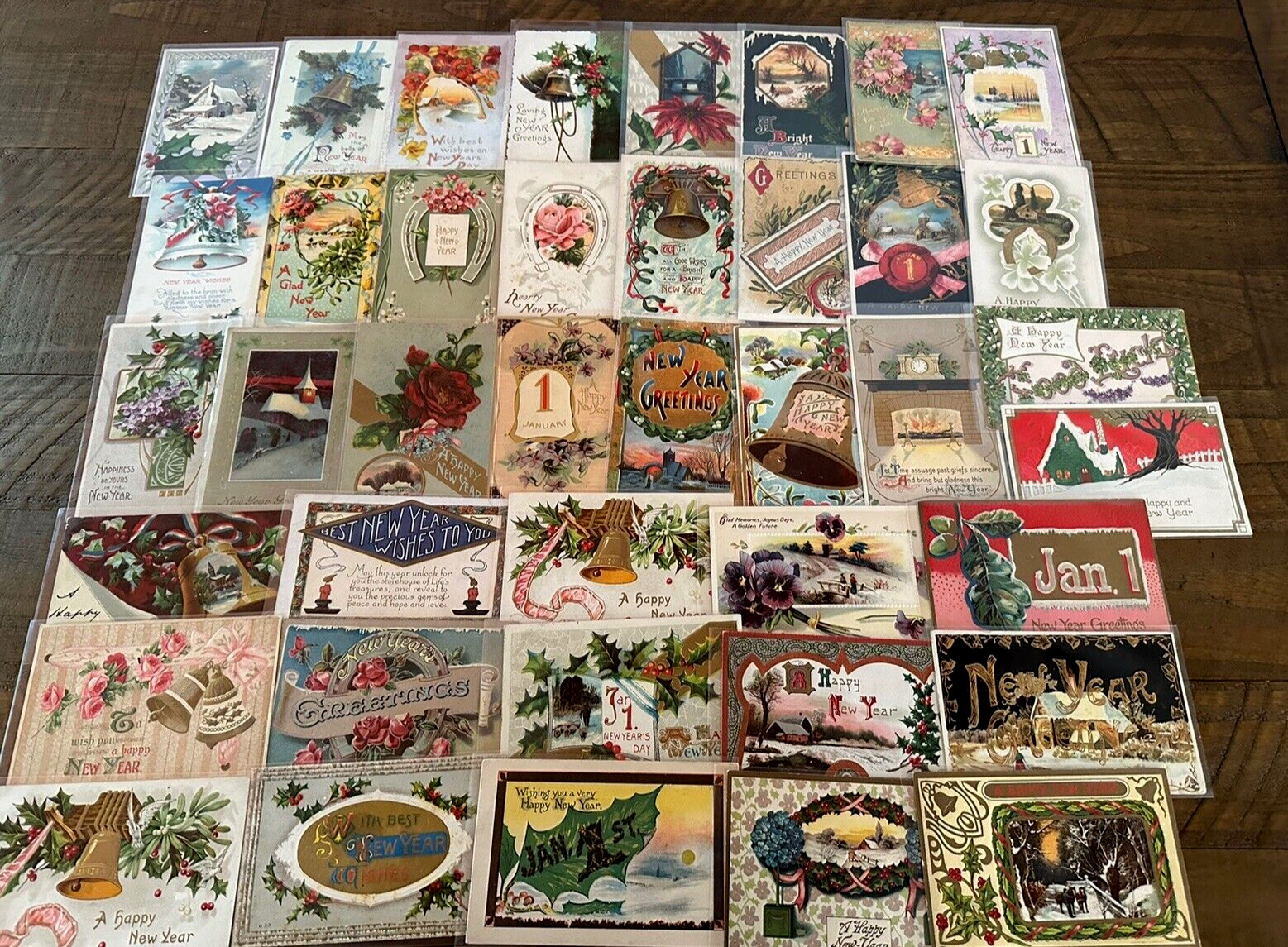 Lot of  40 Antique~NEW YEAR'S ~Vintage Holiday ~Postcards~1900's~in Sleeves~h691