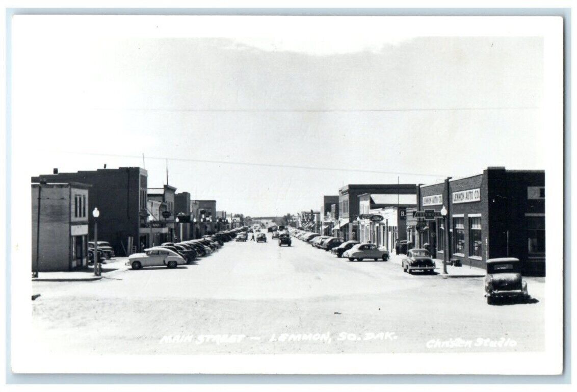 c1950's Main Street View Ford Christen Studio Lemmon SD RPPC Photo Postcard