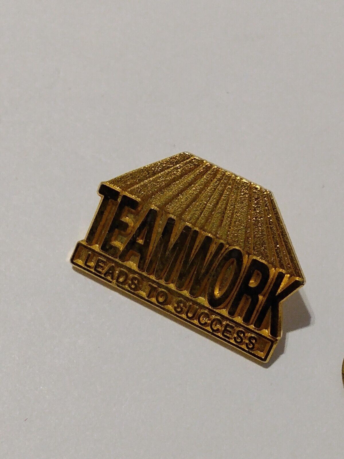 Teamwork Leads to Success Gold Tone Lapel Pin