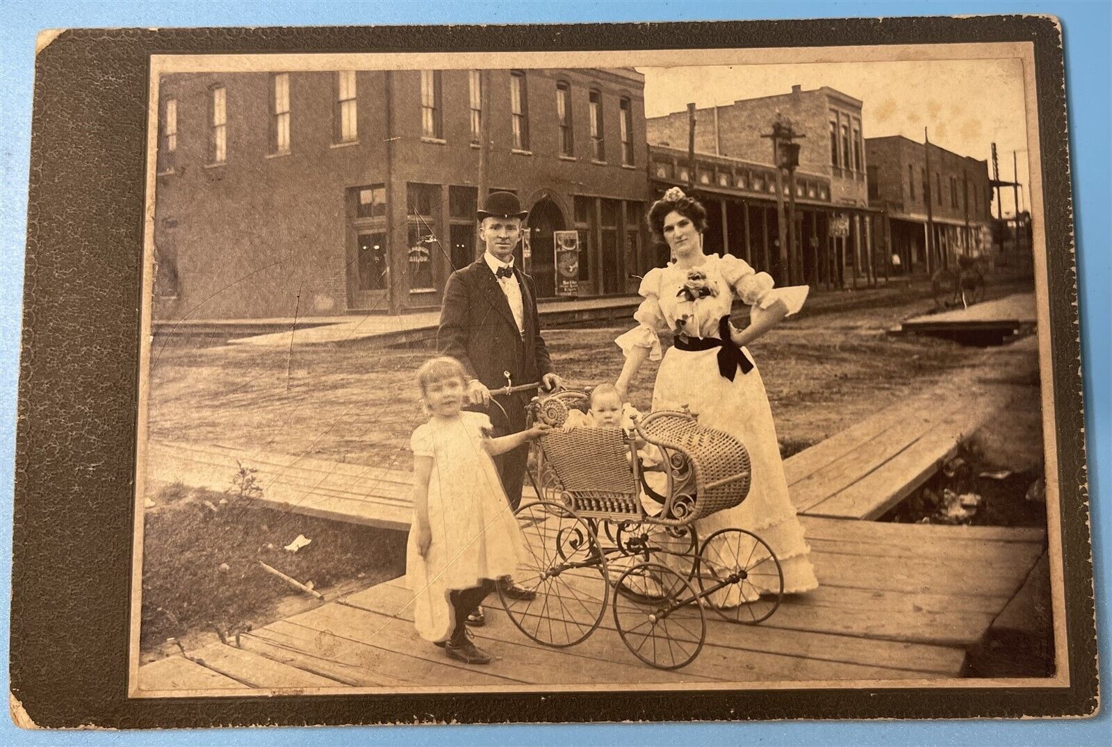 Very Rare Cabinet Card Photo Candid Family With Pram Walking On Boards