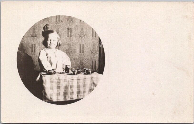 c1910s RPPC Real Photo Postcard Little Girl Playing Tea Party / House Interior