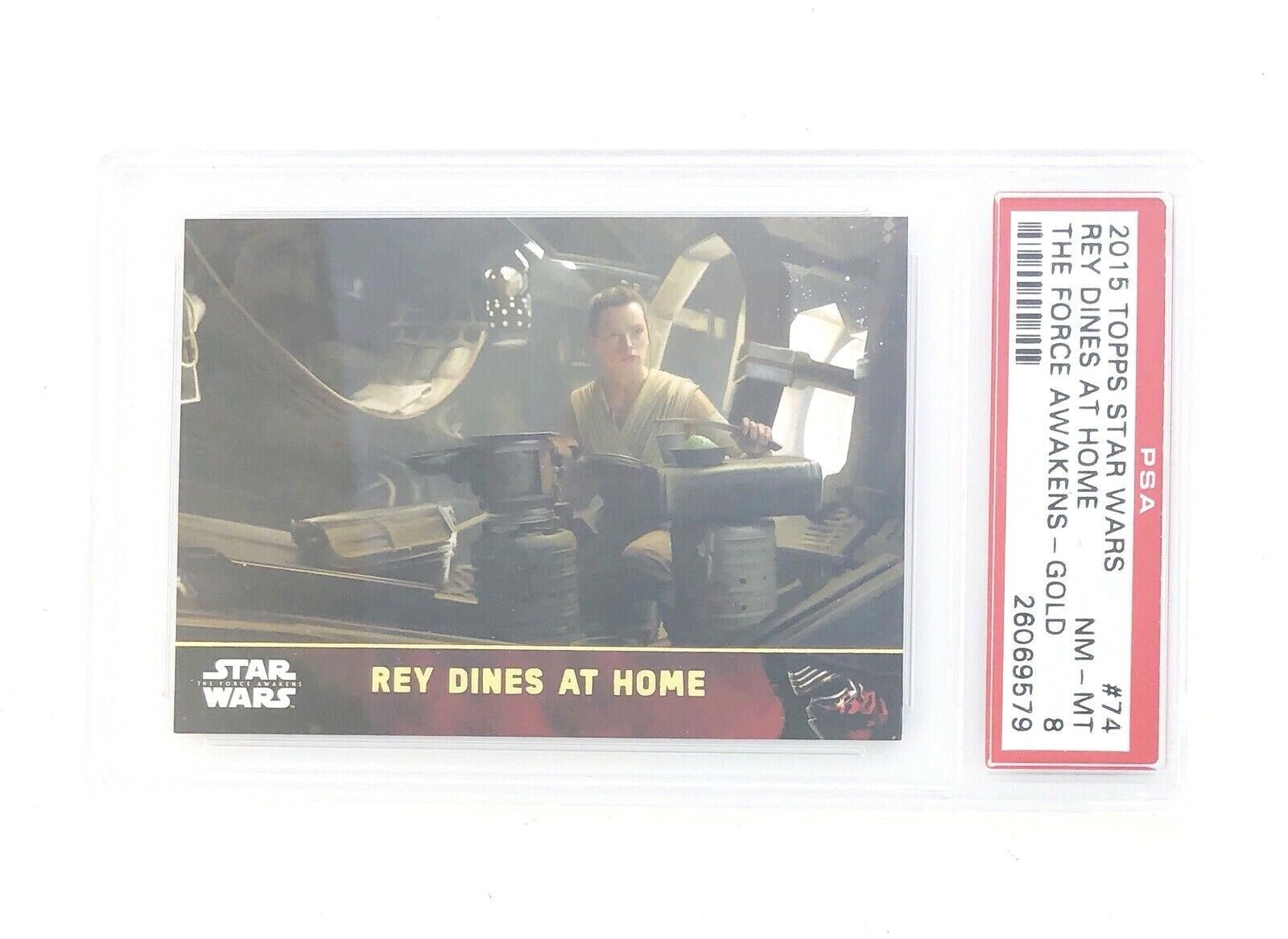 2015 Topps Star Wars Force Awakens Series 1 GOLD Parallel Rey Dines at Home #74