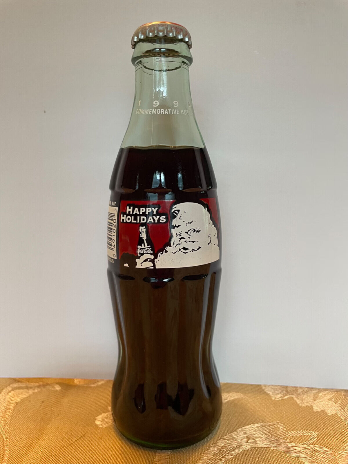1994 HAPPY HOLIDAYS SANTA CLAUS 8 OUNCE GLASS COCA-COLA BOTTLE FULL