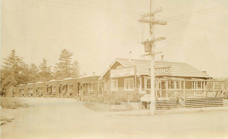 1920s Roadside Log Cabin Tourist Court RPPC Photo Postcard 22-1252
