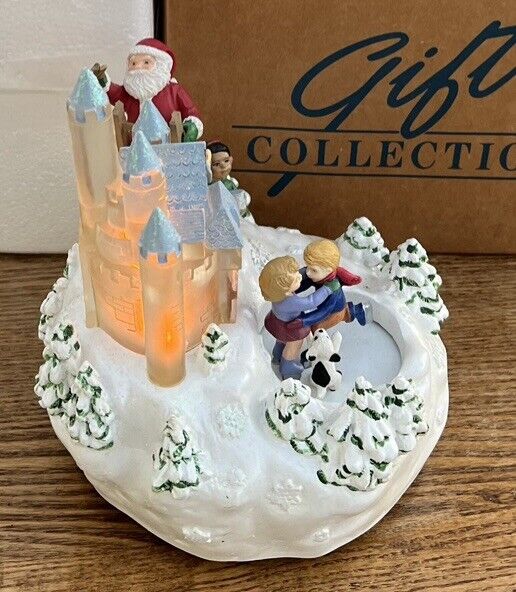 Musical Lighted Santa Christmas Decoration Avon Gifts Collection Skaters Puppy