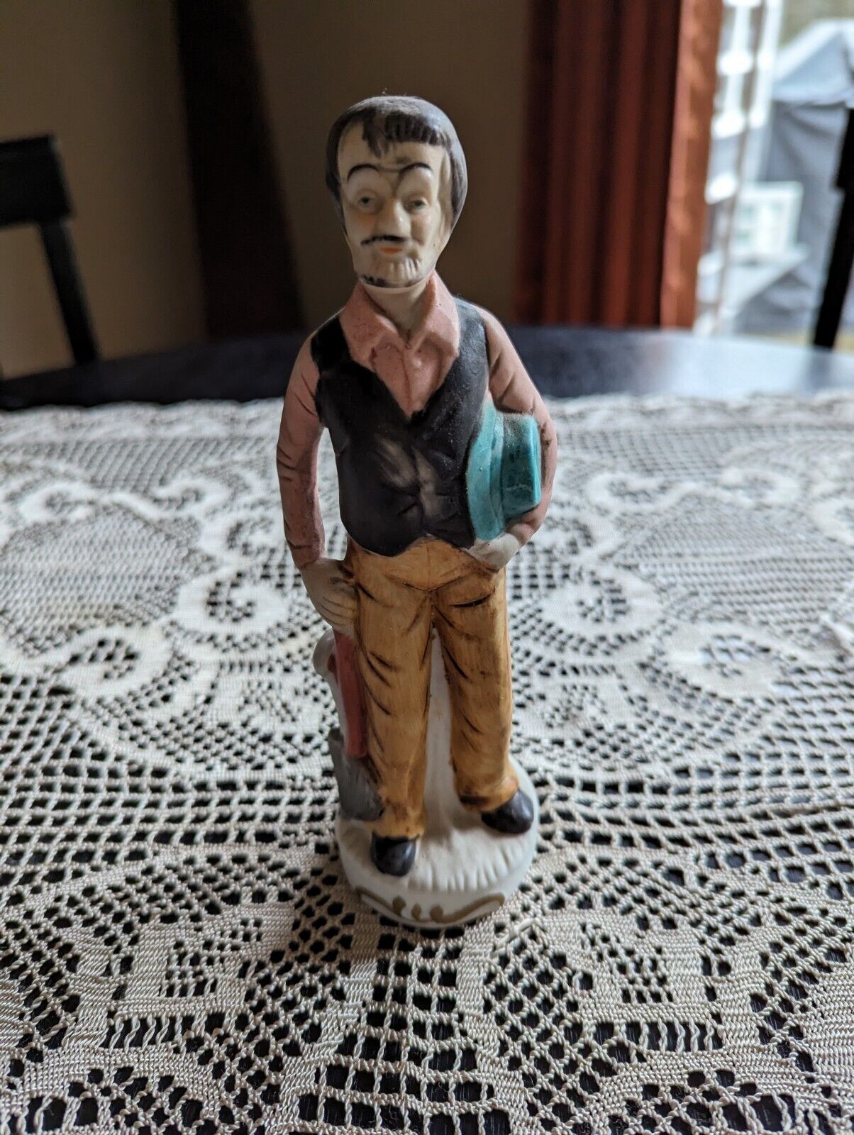 Vintage farm man figurine