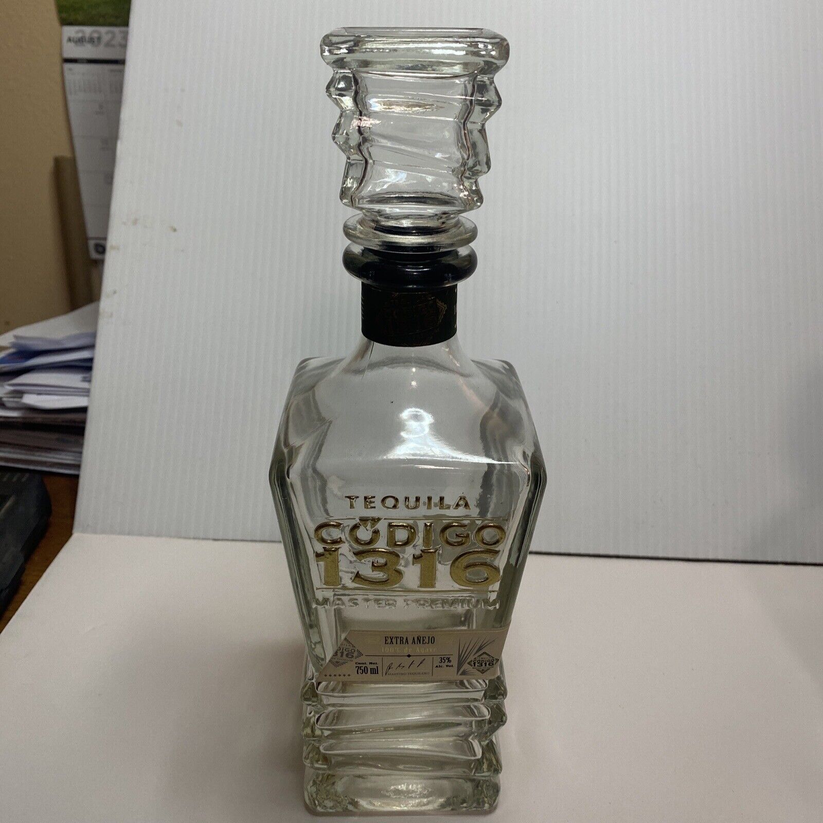 Empty Codigo 1316 Tequila Bottle