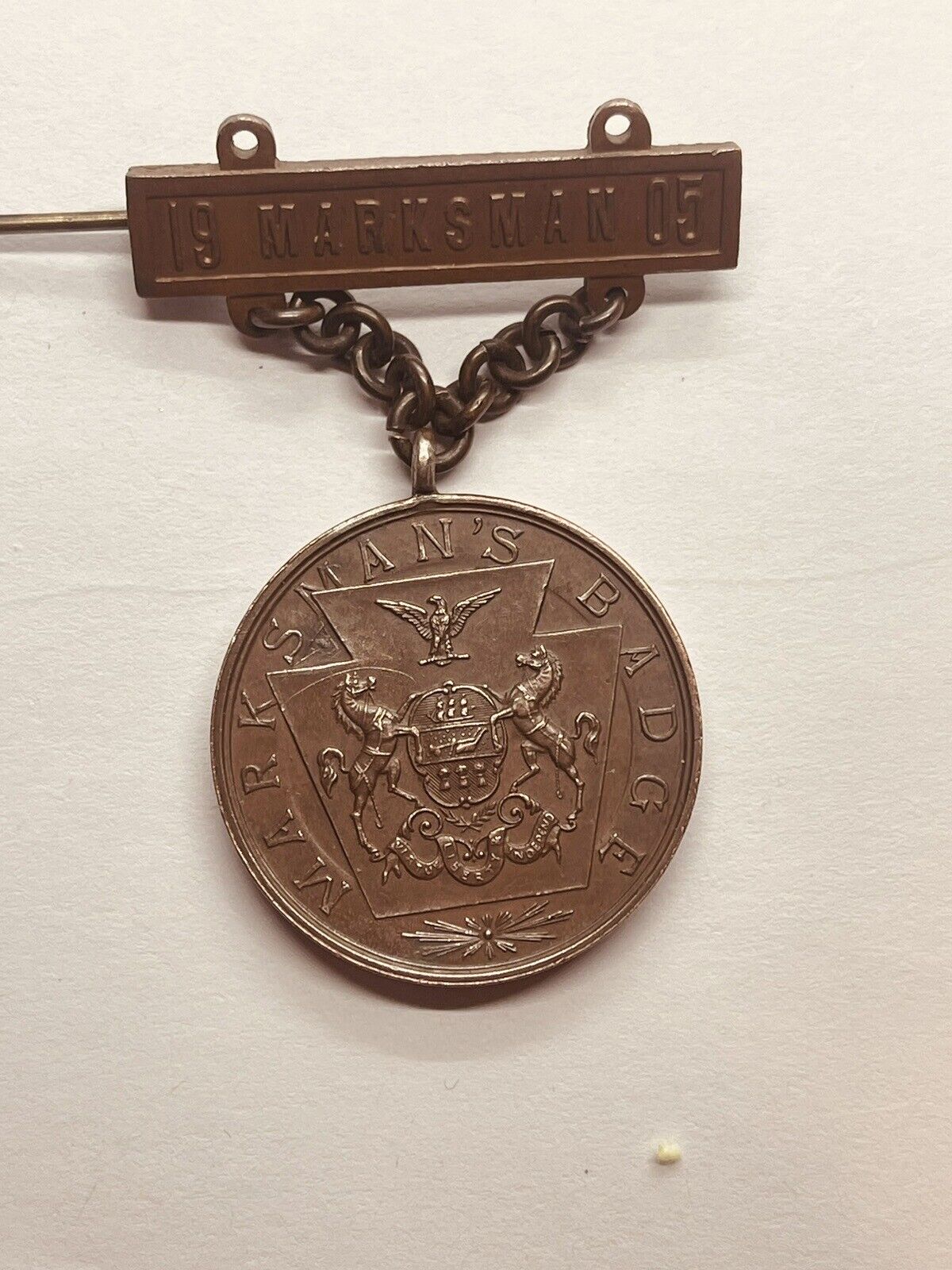 1905 MARKSMAN Badge Metal NCP Bronze. JK Davison Phil’s.  Engraved