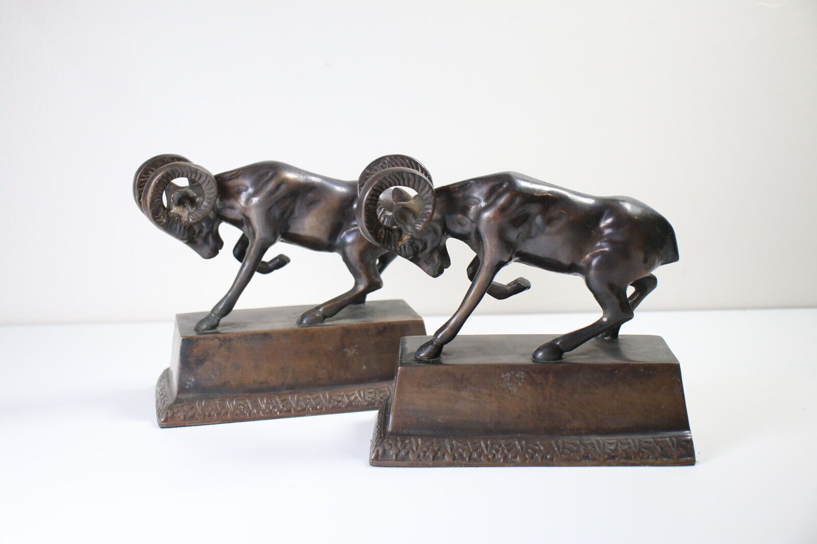 Vintage Castilian Imports bronze ram bookends