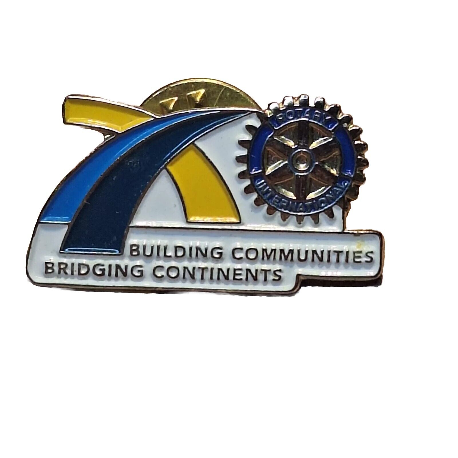 Vintage Rotary International BUILDING COMMUNITY BRIDGING CONTINENTS LAPEL PIN 