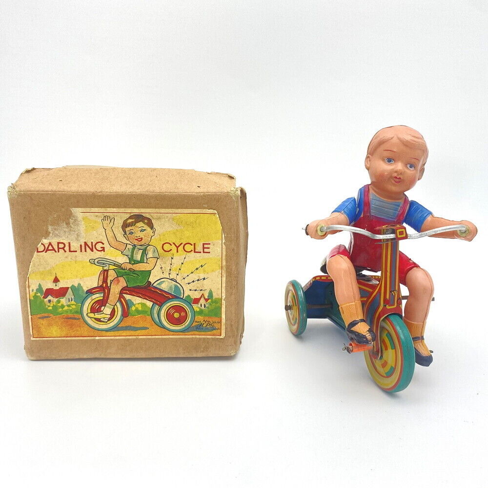 With rare box Curiosities 1950s Alps Shoji Made in Japan Boy riding a tr