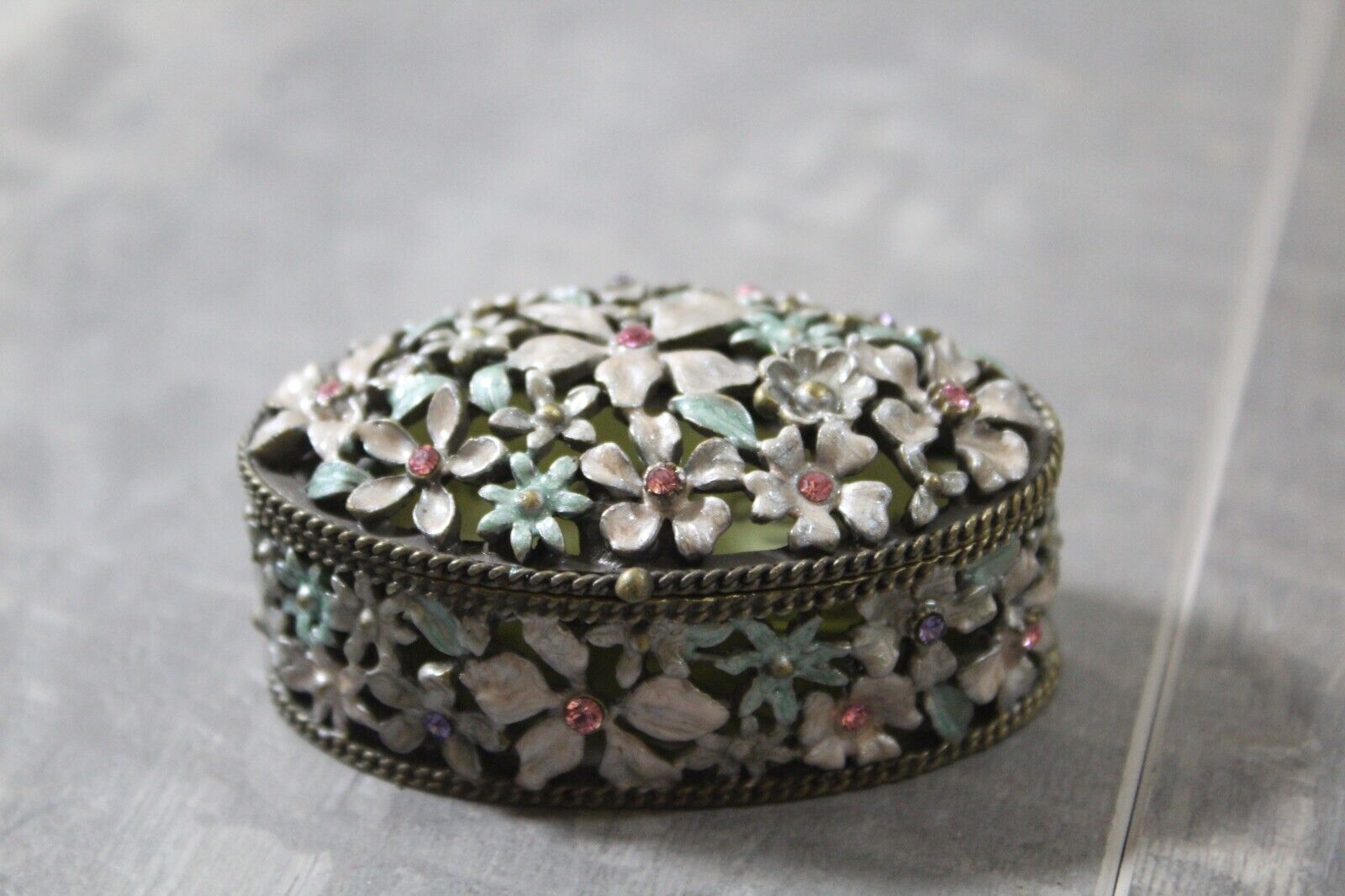 Vintage trinket box hinged enamel flower rhinestones metal oval