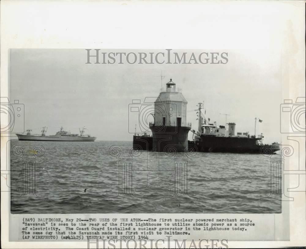 1964 Press Photo Nuclear powered merchant ship near lighthouse at Baltimore