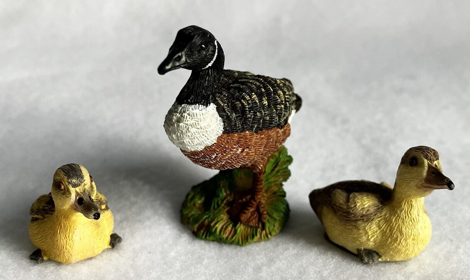 set three geese one adult two chicks resin detailed