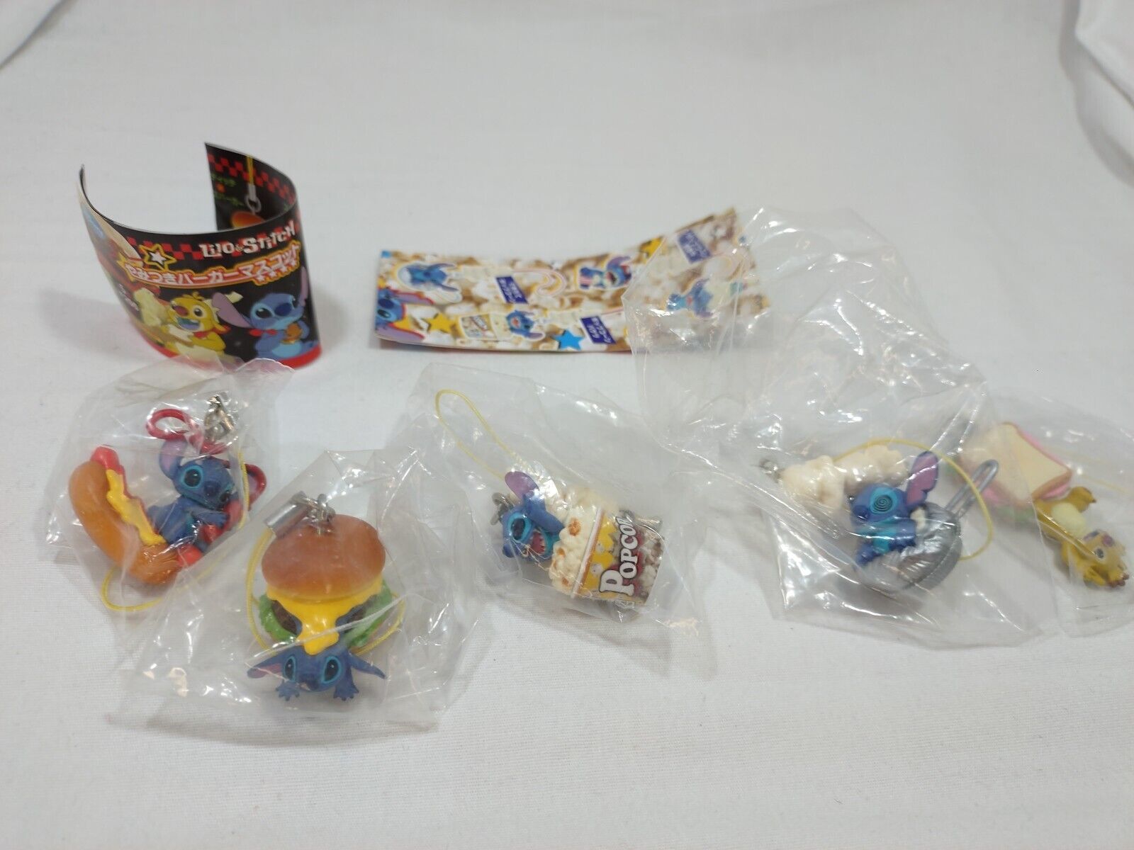 5xLot: Disney Stitch Gashapon Yujin Capsule Toys — Phone Charm, Purse Strap