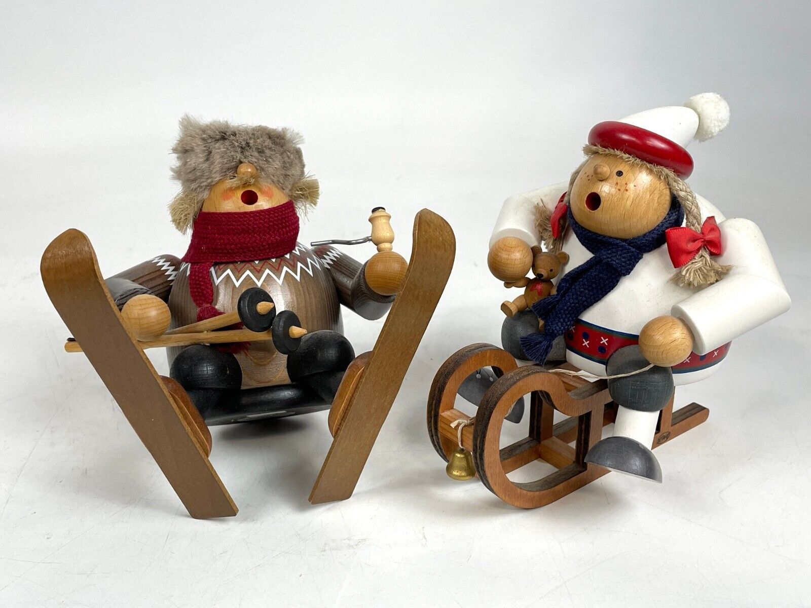 Set of 2 KWO German Incense Smokers Skier Sitting and Girl on Sled w/ Teddy Bear