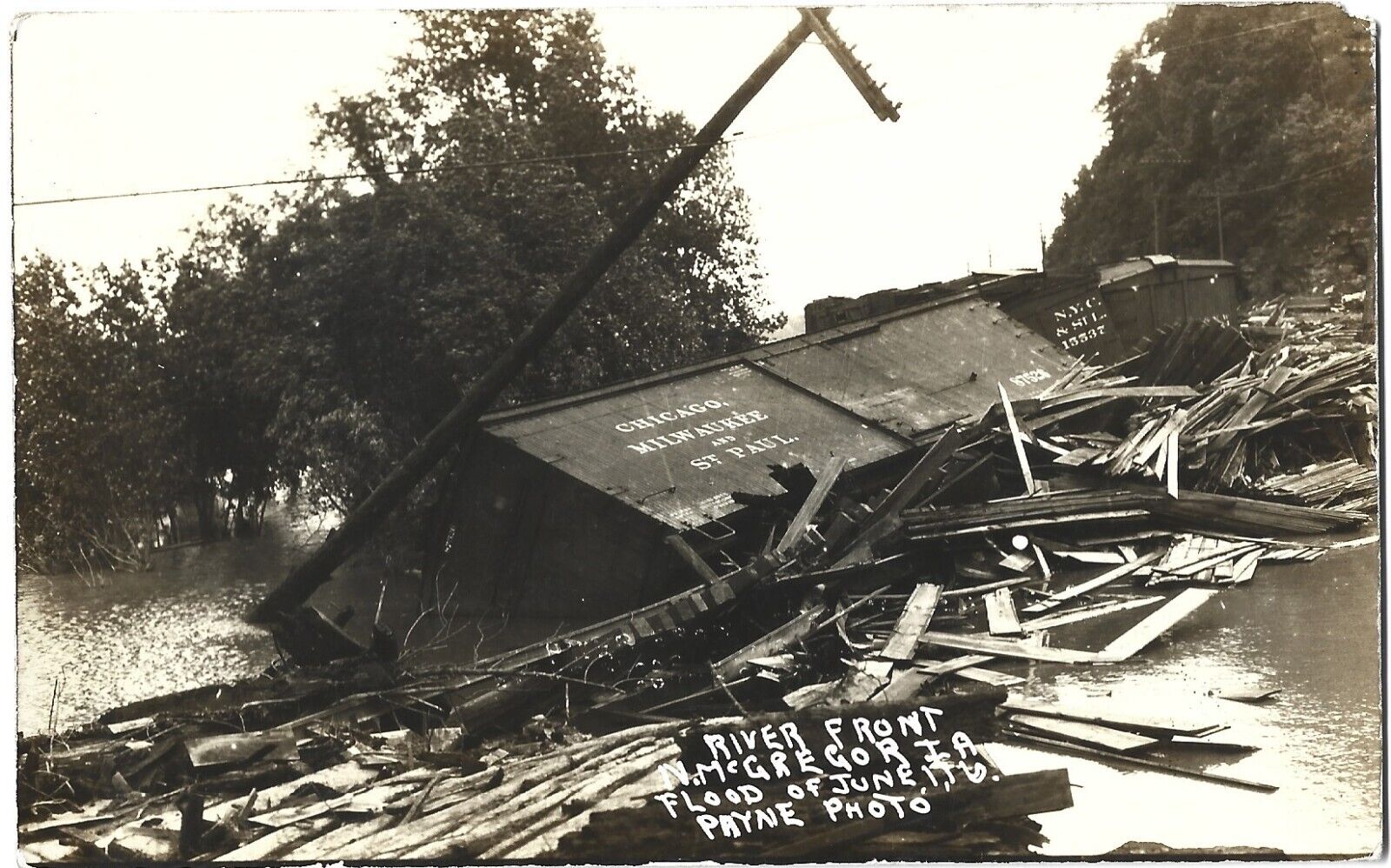 N. McGregor IA 1916 flood--CM&StP and NYC&StL box cars destroyed; nice 1916 RPPC