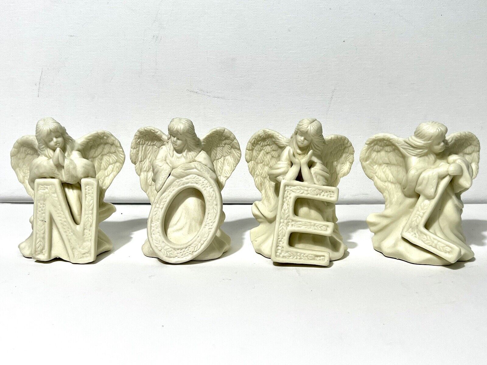 4 Ceramic Angels Holding Letters To Spell Noel Christmas Holiday Decor 4\