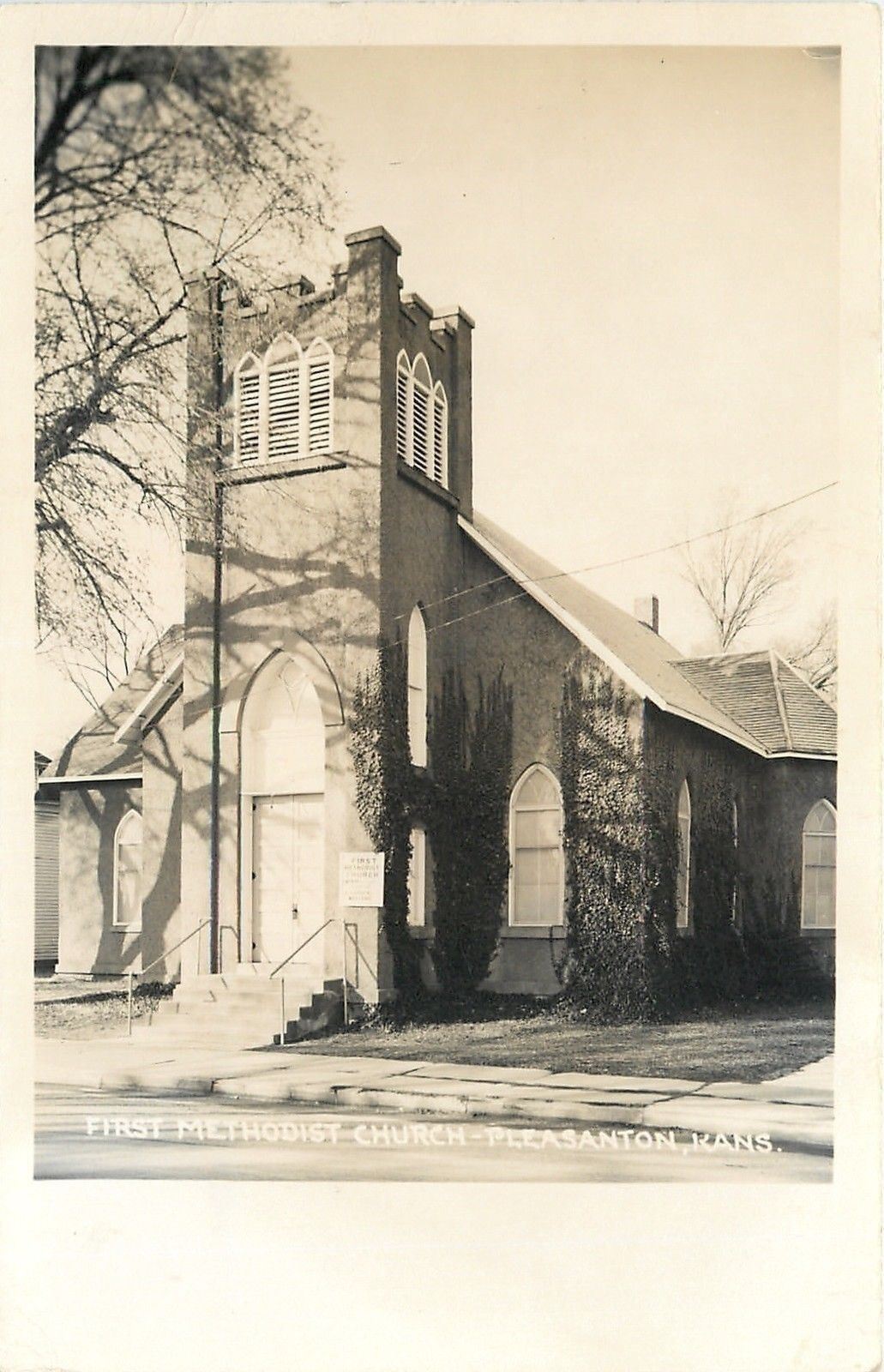 Pleasanton Kansas~Some Ivy on Corners of 1st Methodist~Real Photo Postcard c1950