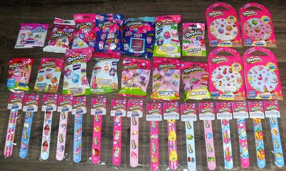 SHOPKINS LOT OF (34) DIFFERENT ITEMS PLUSH,ERASERS,FASHION TAGS,TRADING CARDS