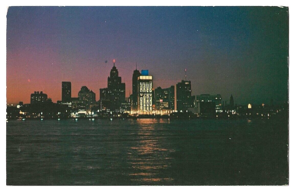 Detroit Michigan c1960\'s skyline at Night, business district, river view