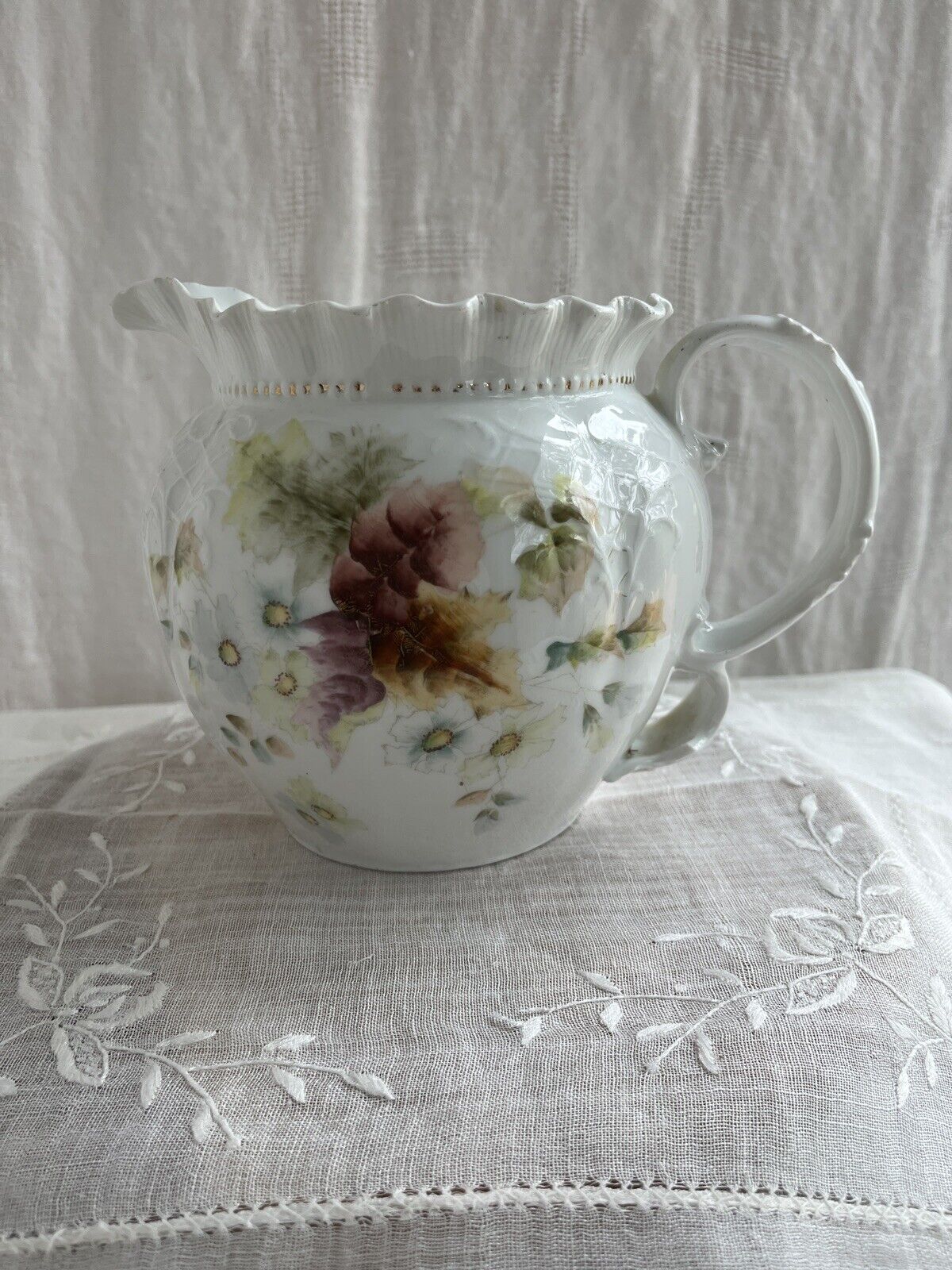 Antique porcelain hand painted pitcher vase