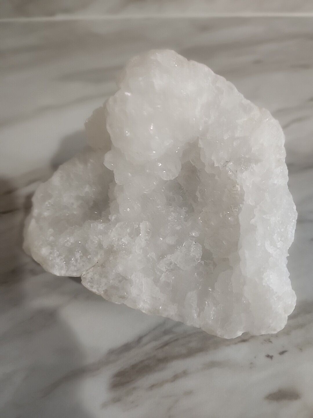 1 lb 10 oz Clear Crystal Geode 5in Wide
