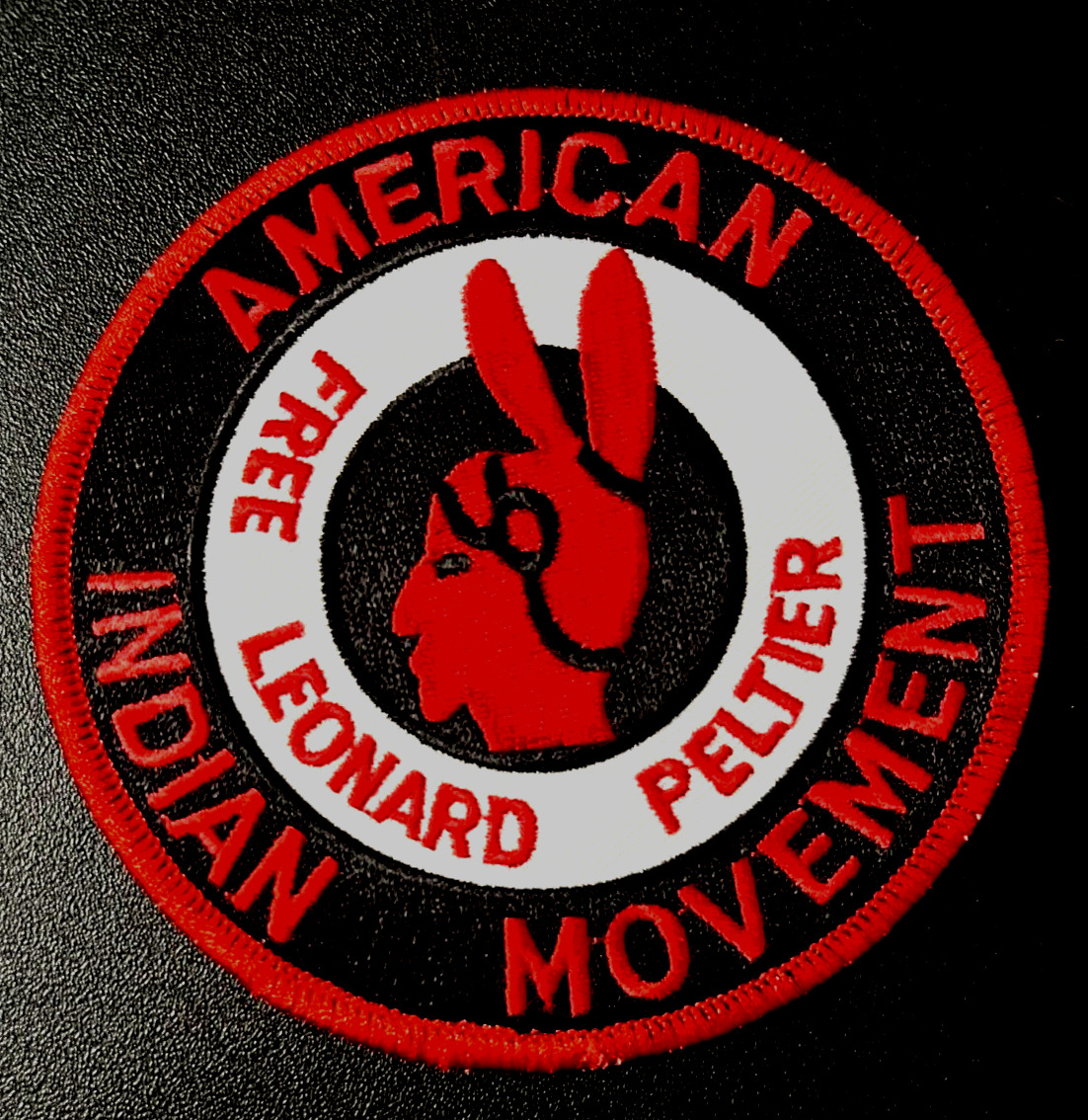 AIM AMERICAN INDIAN MOVEMENT FREE LEONARD PELTIER PATCH (NC)