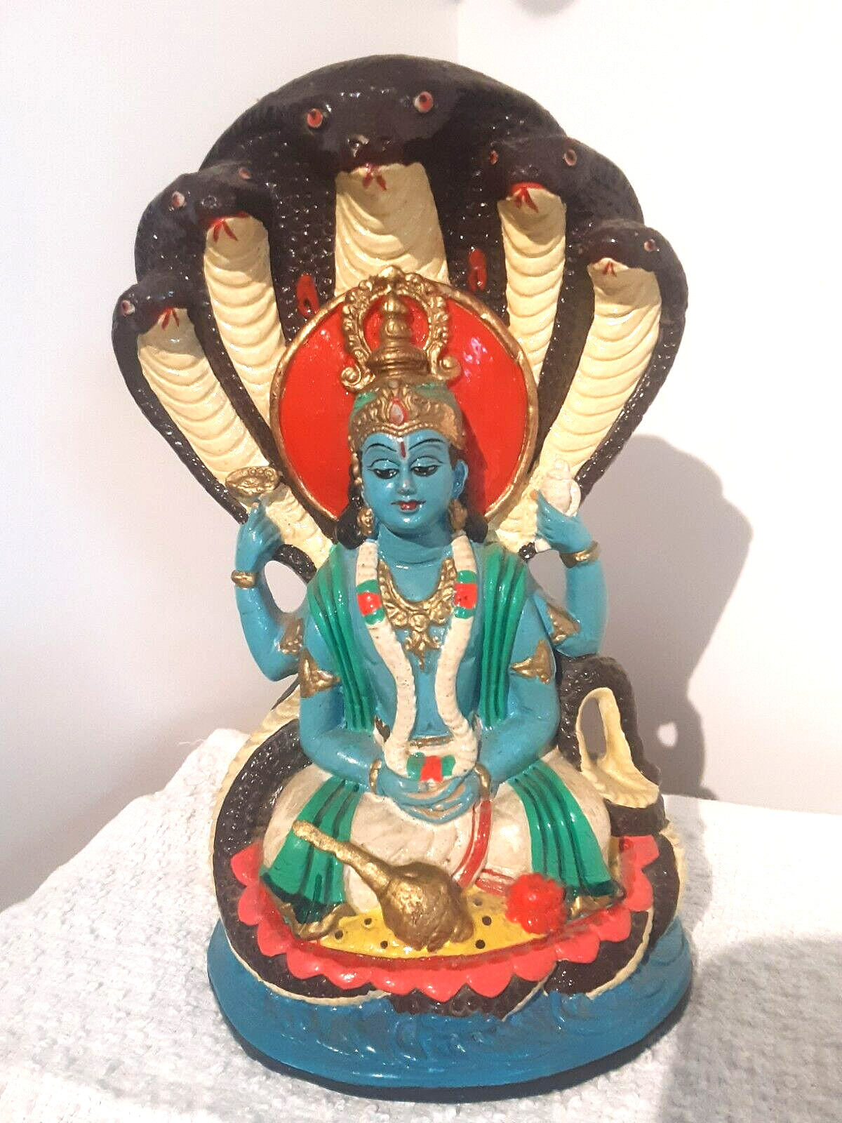 Hindu Goddess Vishnu, sitting on Cobra with 5 Heads