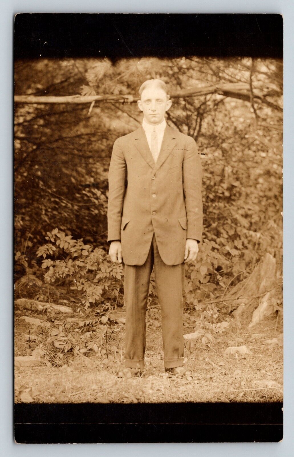 RPPC Young Man Stands In The Woods Suit & Tie FASHION VINTAGE Postcard AZO