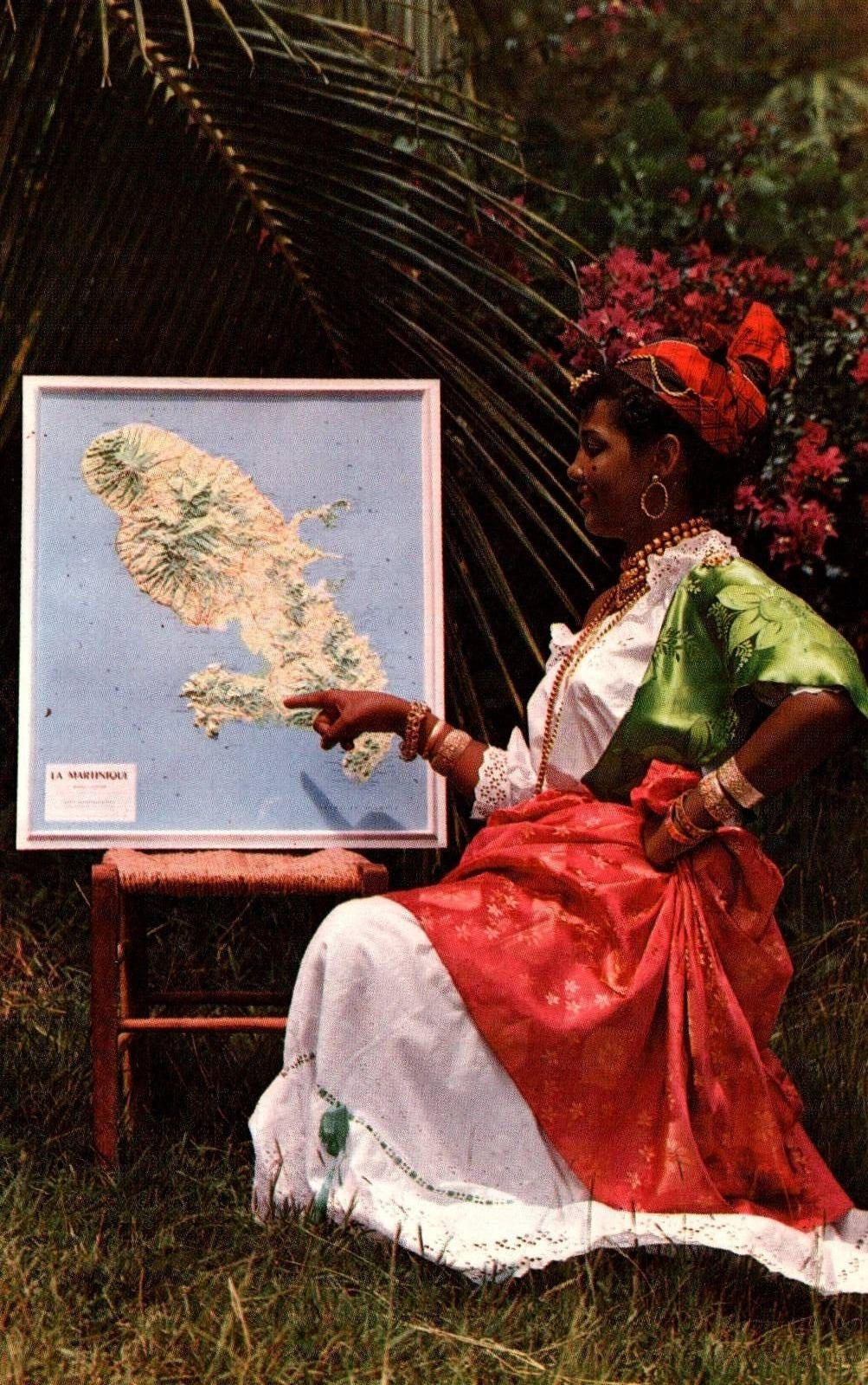 Martinique Island Welcome Girl pointing to Map  Vintage Postcard
