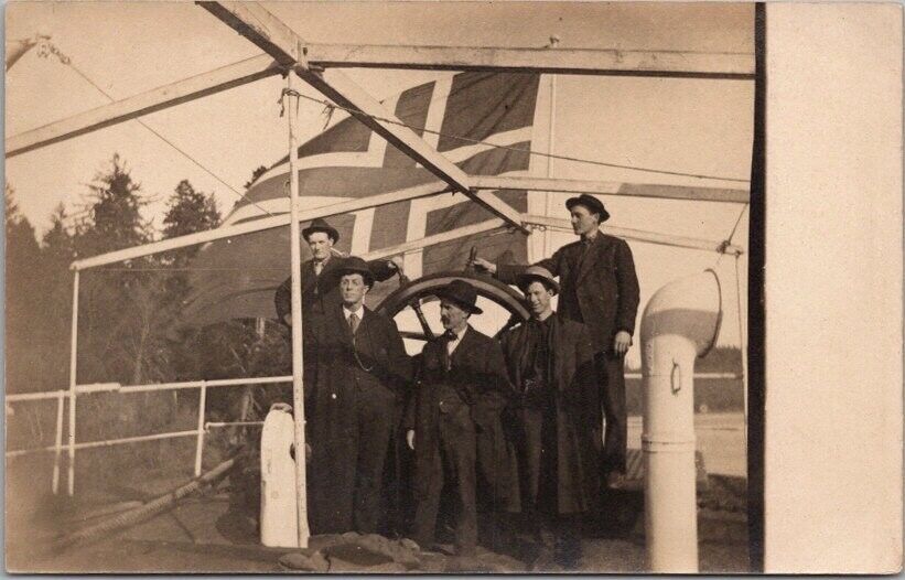NORWAY Real Photo RPPC Postcard Five Guys on Ship Deck / Wheel & Norwegian Flag