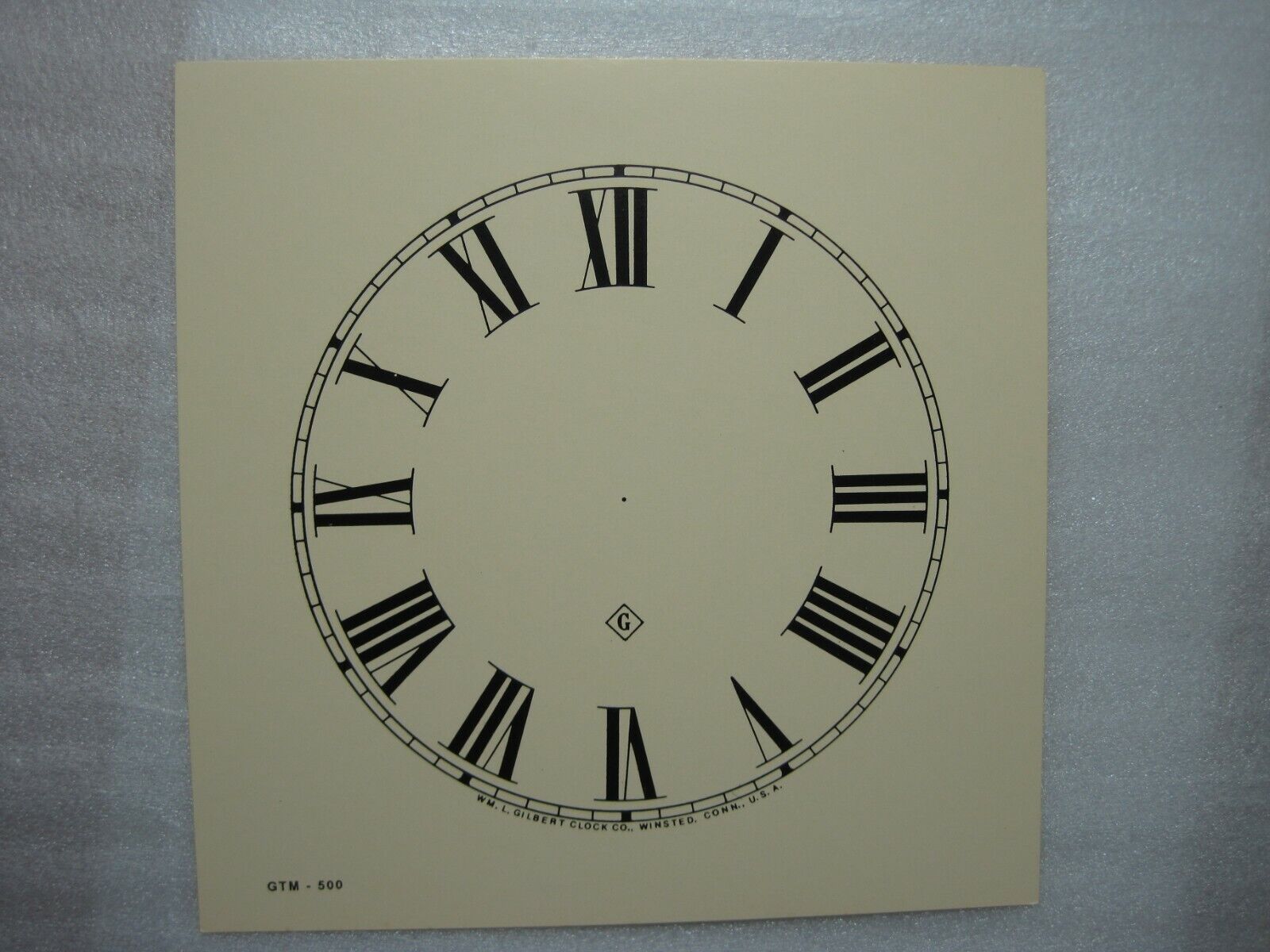 5 inch diameter light tan, matte Paper Clock Dial NOS Gilbert