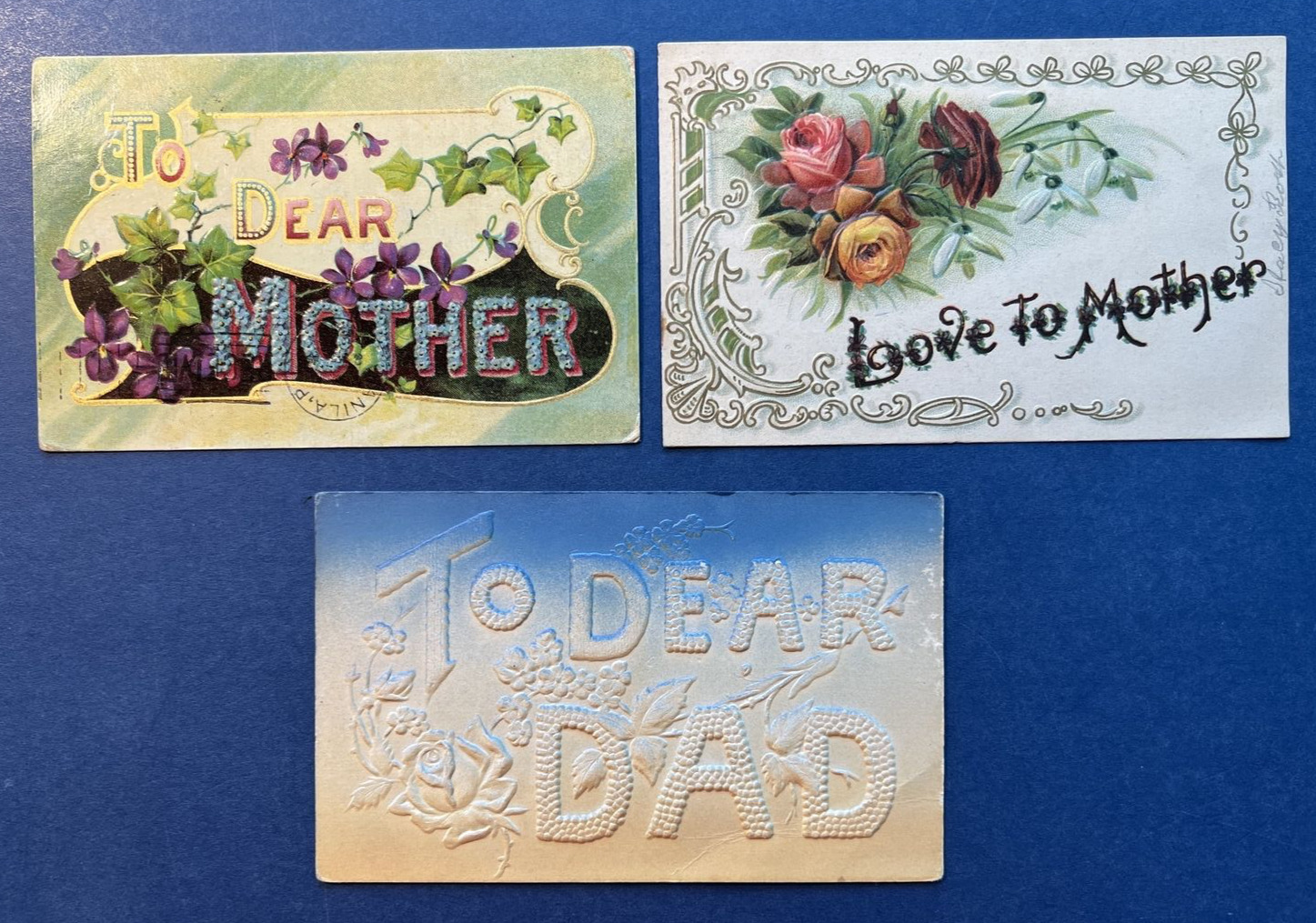 3 Mother's & Father's Day Antique Postcards. 2 EMB w Gold. 1 Air Brushed.