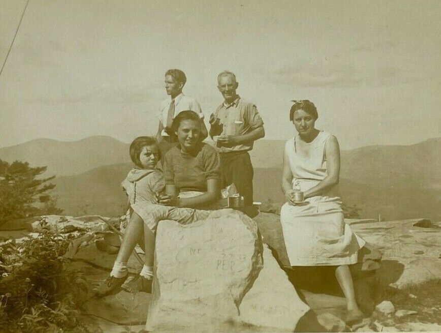 Family Sitting On Rock Eating In Mountains B&W Photograph Snapshot 3.5 x 5.75