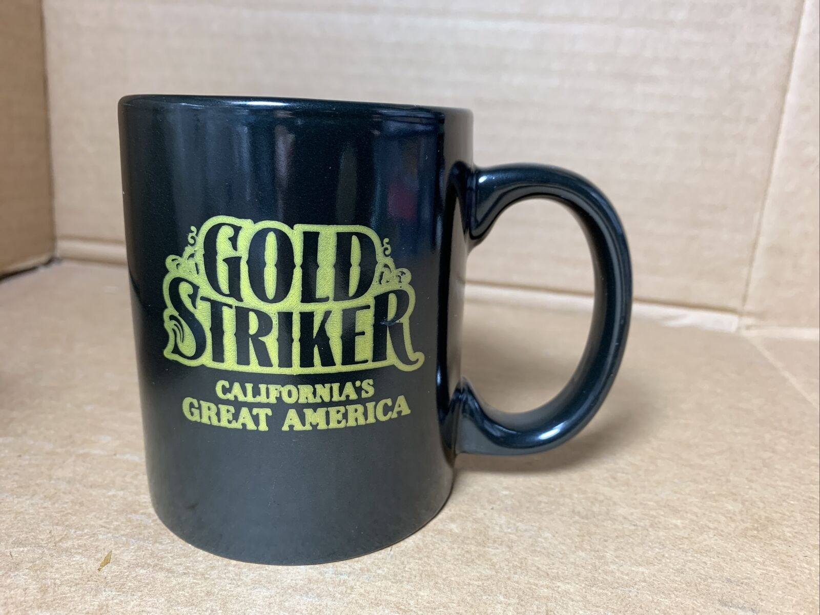 Vtg GOLD STRIKER rollarcoaster California\'s Great America black ceramic MUG CUP