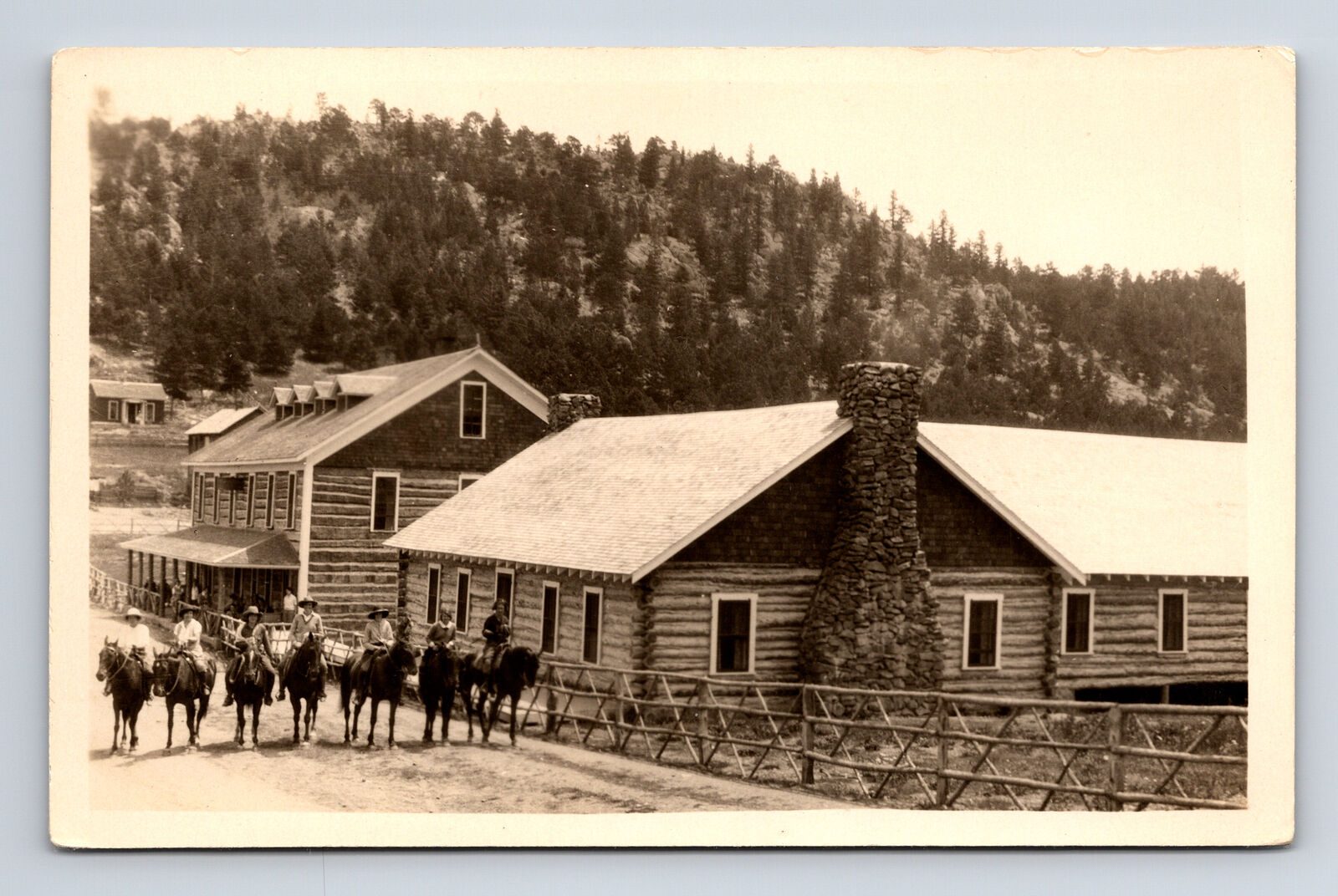 RPPC Blue Bird Lodge Log Cabins Horse Riders Gold Hill Colorado CO Postcard