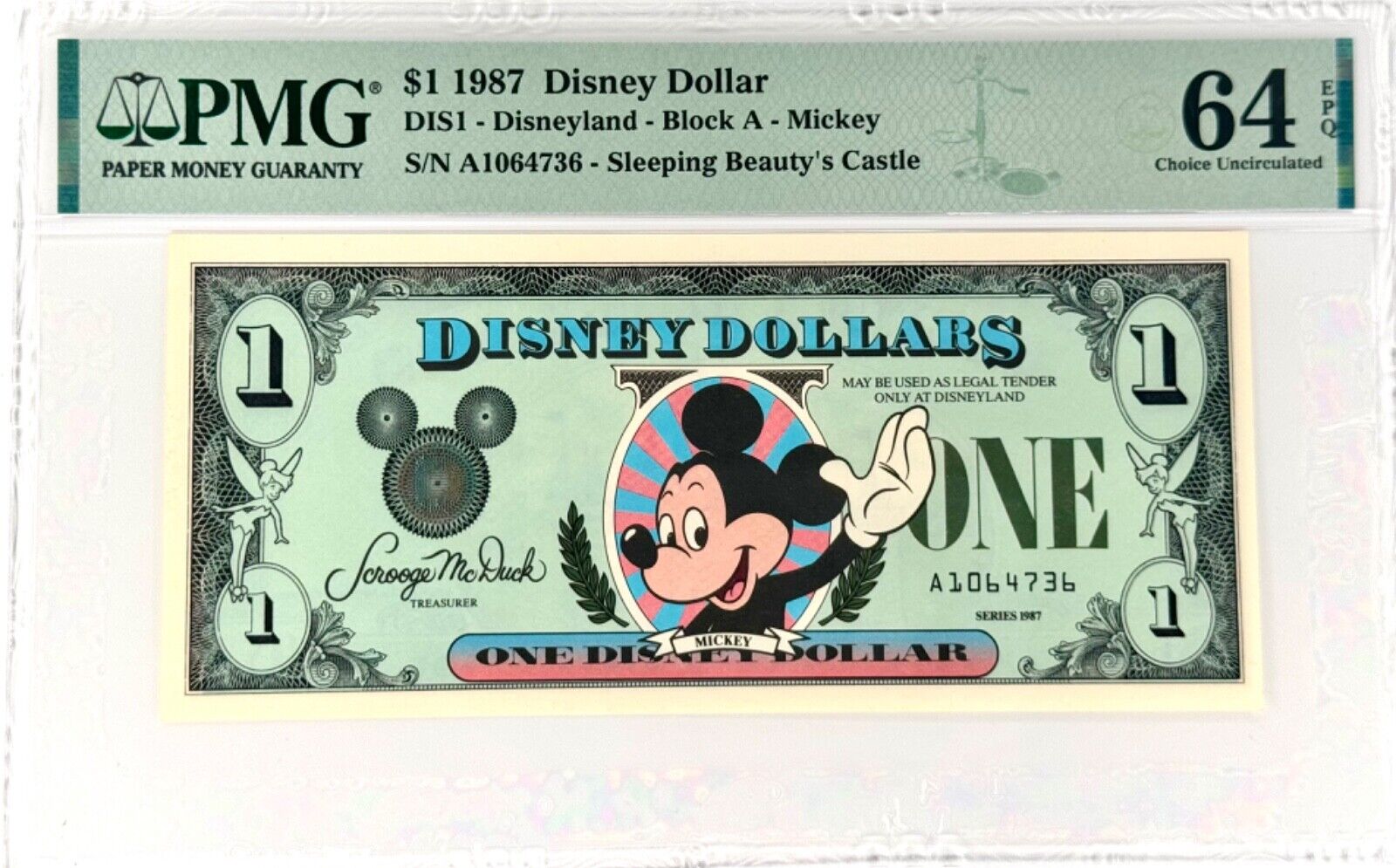 1987 $1 Disney Dollar - Waving Mickey - 1 St Run with Error PMG64 (S/N A1064736)