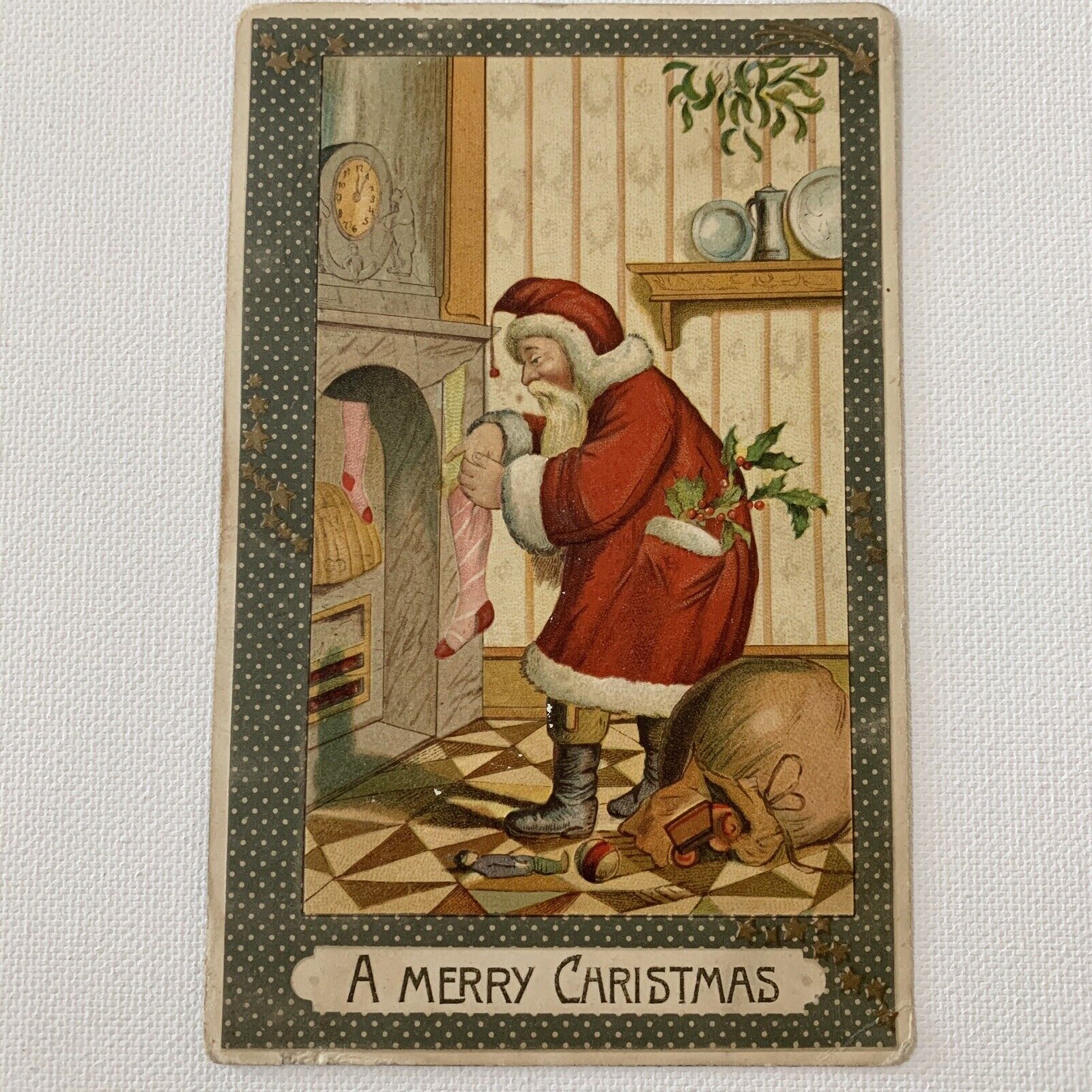 Antique Postcard Embossed Christmas Santa Filling Stocking New York Germany