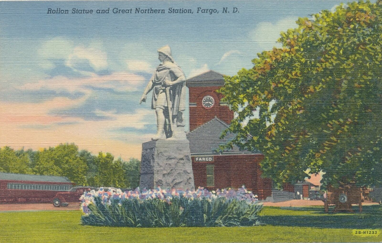 FARGO ND - Rollon Statue and Great Northern Railroad Station