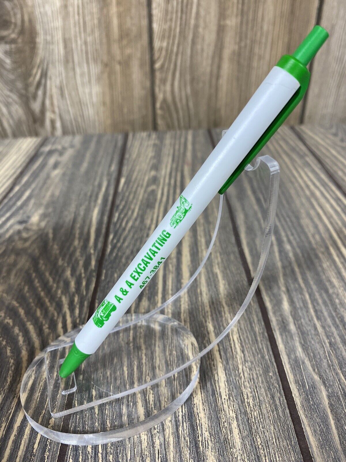 Vintage A & A Excavating White Green Retractable Pen Advertisement