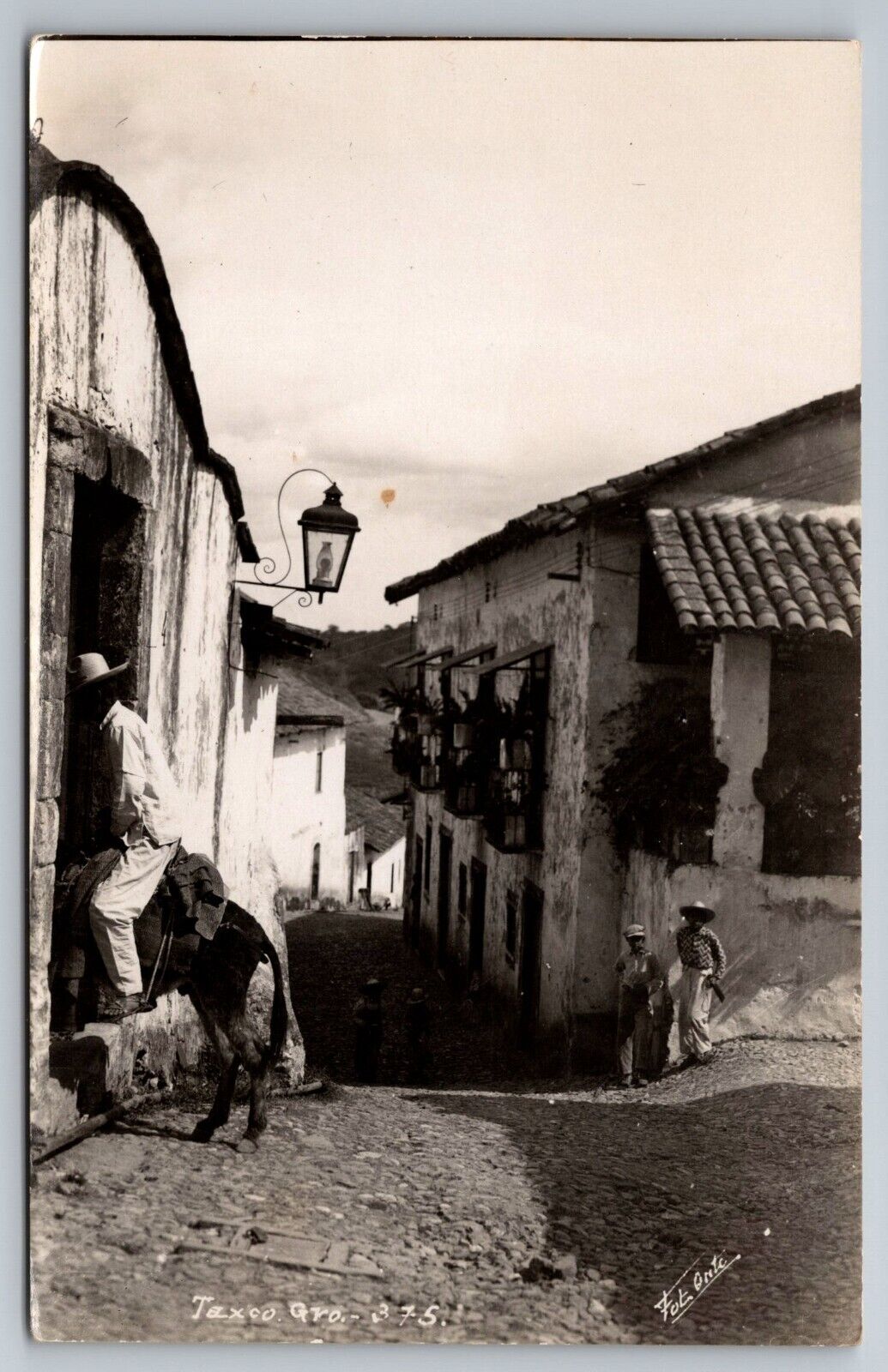 Taxco Mexico Streets, House, and People.  Real Photo Postcard. RPPC