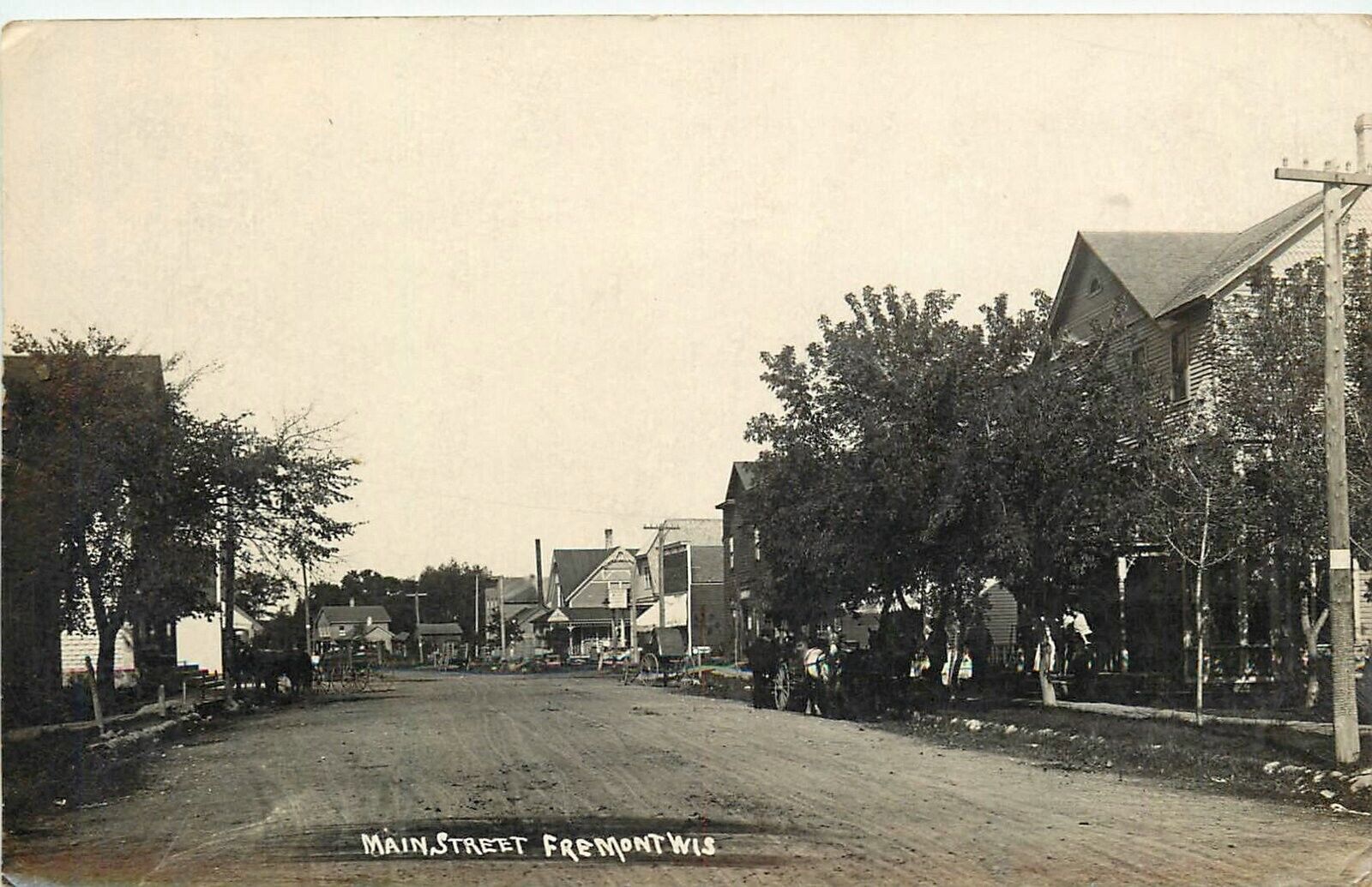 Postcard RPPC 1907 Wisconsin Freemont Main Street WI24-4888