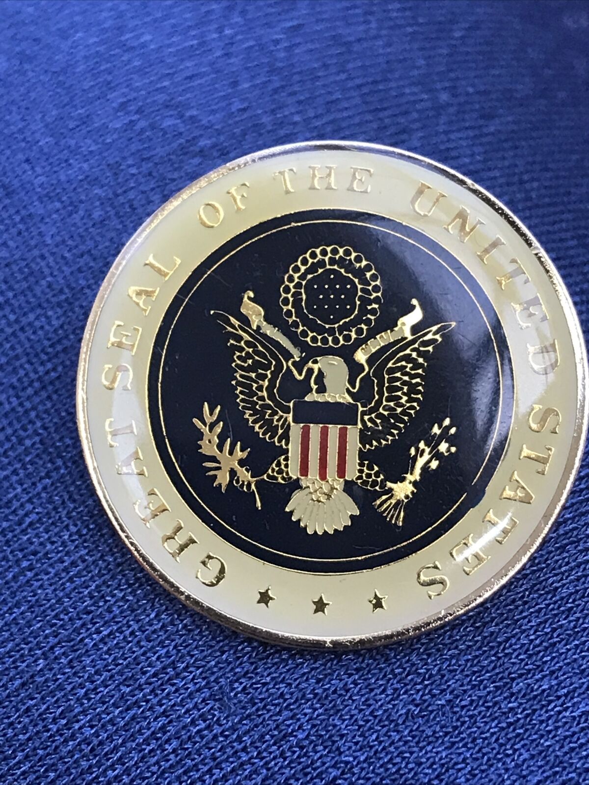 Great Seal Of The United States pin. Gold reflective letters. Kept as a treasure