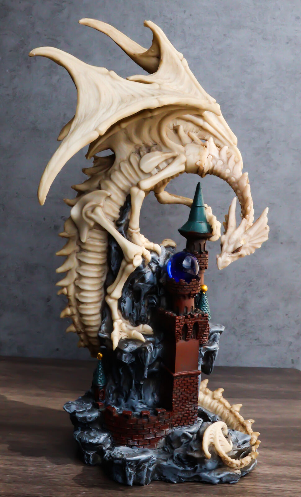 Gothic Skeleton Bone Dragon Perching On Rocky Mountain Castle Tower Figurine