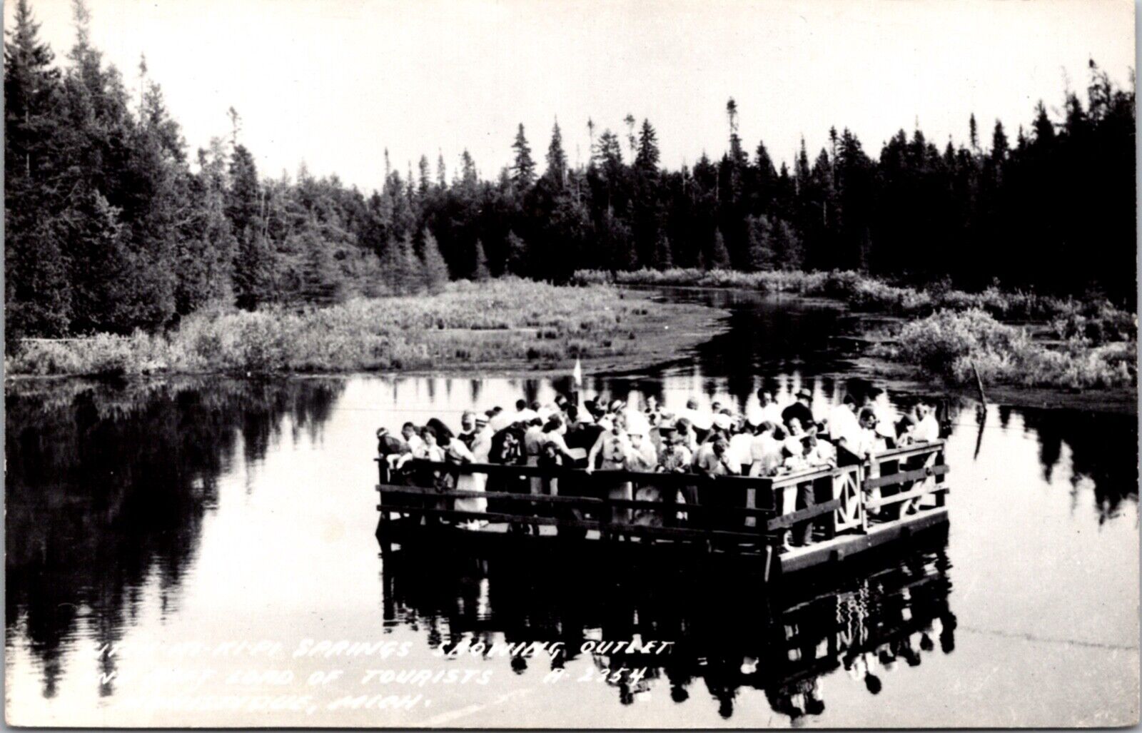 Real Photo PC Kitch-iti-kipi Springs Raft Load of Tourists Manistique, Michigan