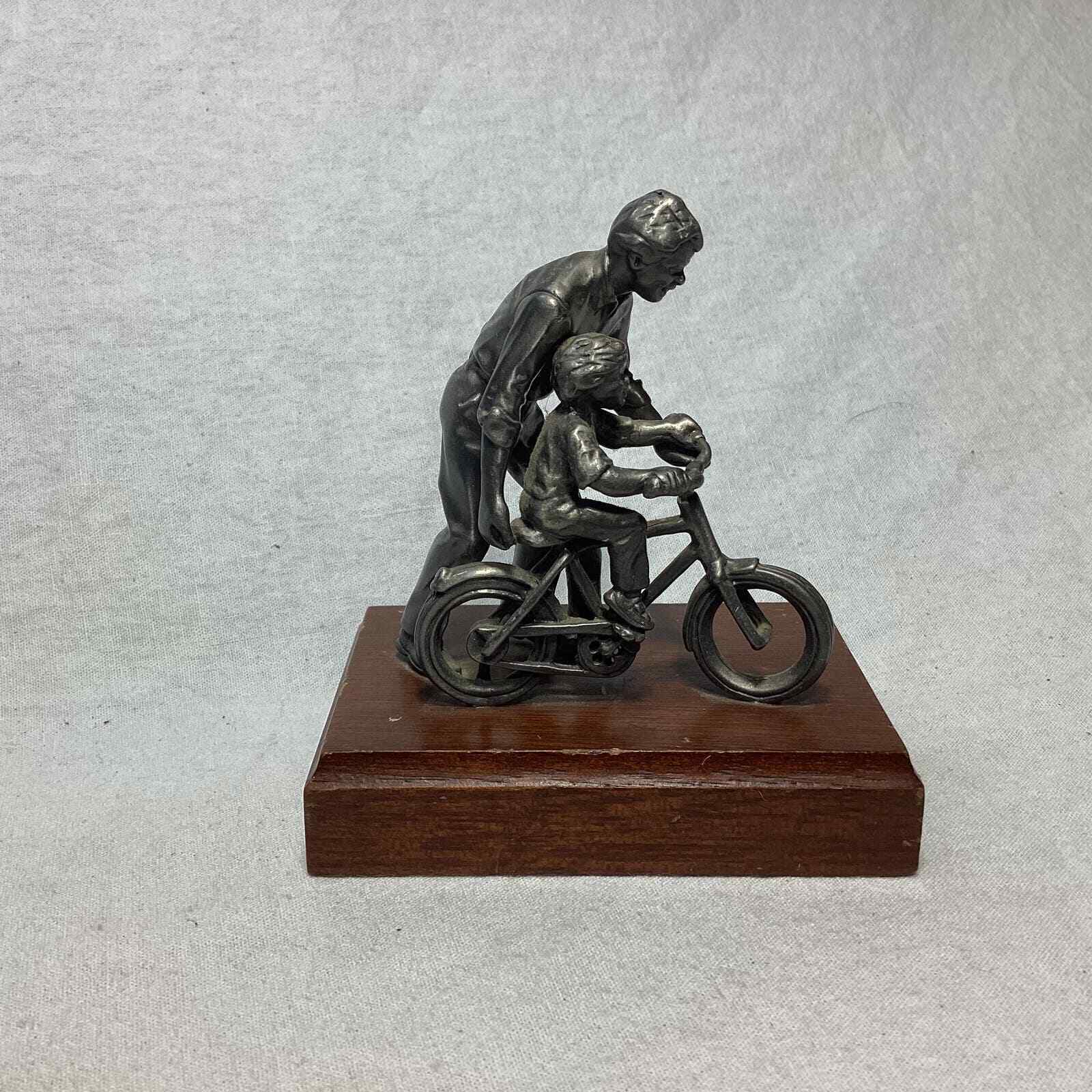 Pewter Father Teaching Son to Ride a Bike Figurine