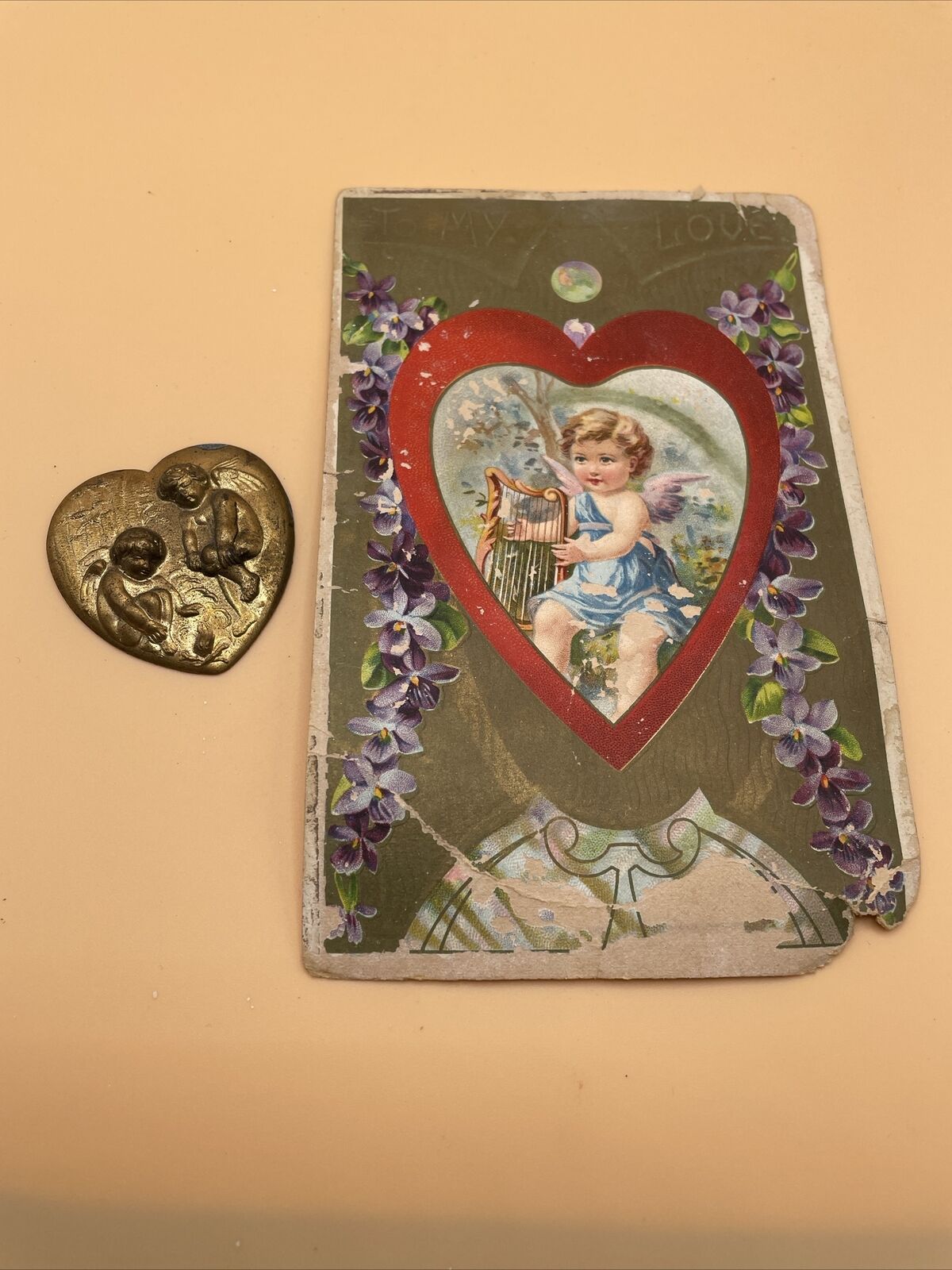 Antique 1900’s Cupid Valentine Embossed Postcard & Antique Metal Cupid Heart