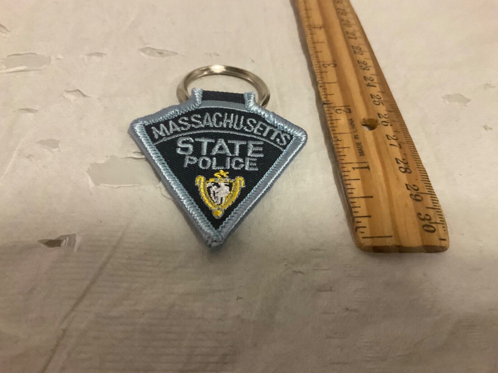 Massachusetts State Police Patch key chain.