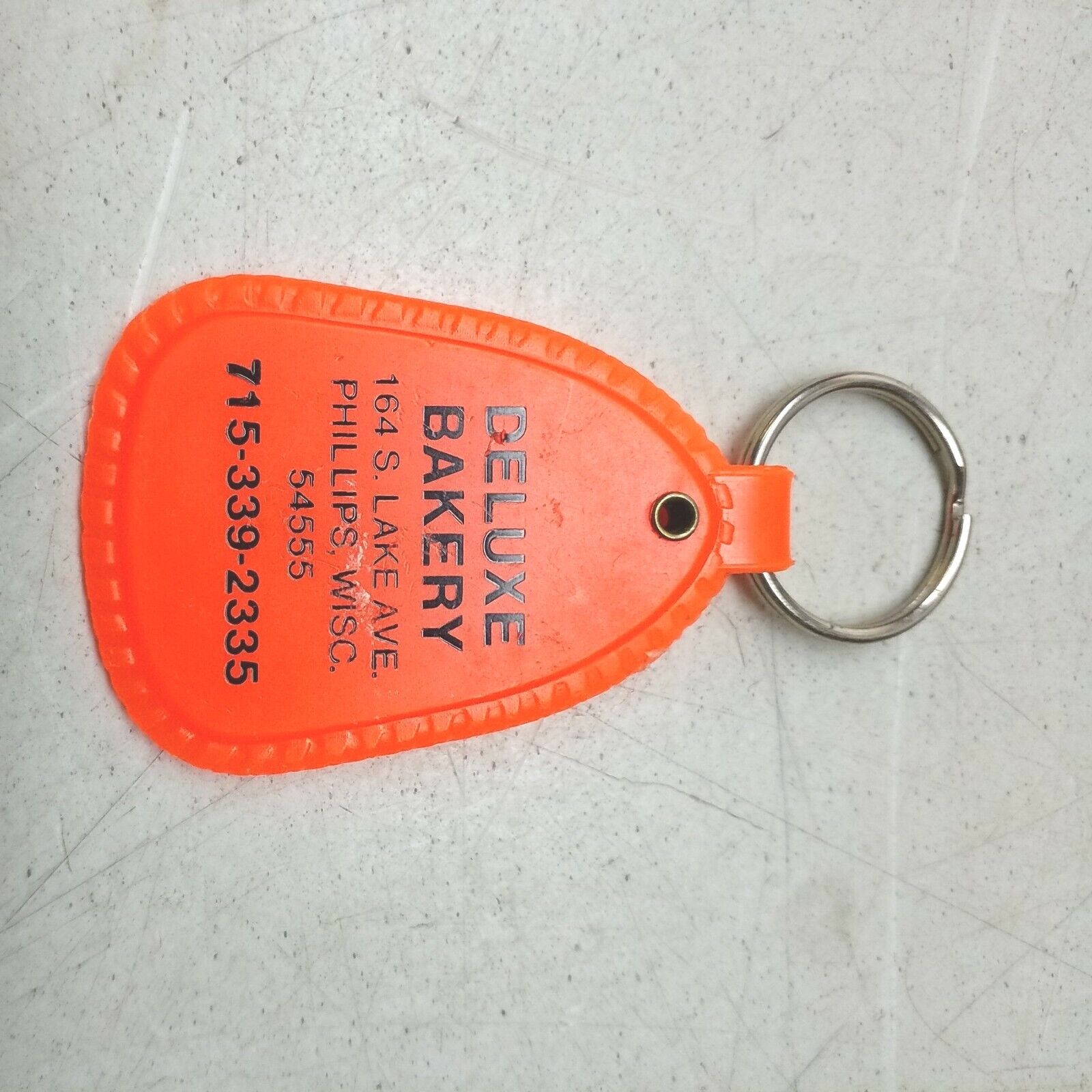 Vintage Deluxe Bakery Keychain Fob Phillips Wisconsin Closed Business 